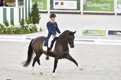 WEG-Dressage-8-25-14-GPTeam-0003731-DierderikvanSilfhout-ArlandoNHNOP-NED-DDeRosaPhoto