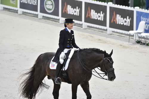 WEG-Dressage-8-25-14-GPTeam-0004019-TinaKonyot-CalectoV-USA-DDeRosaPhoto